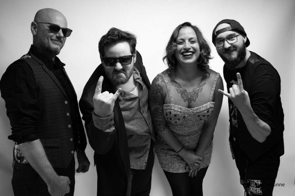 Bellwether Ritual posing for a picture at Studio 1 Thrift