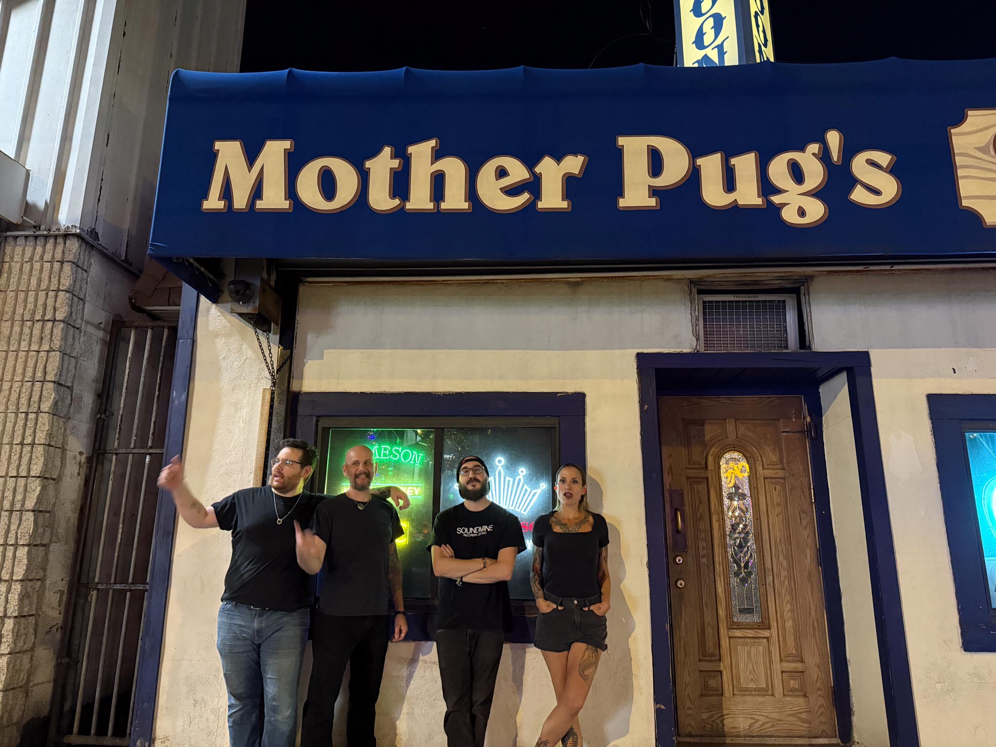 Bellwether Ritual standing outside Mother Pug's in Staten Island.